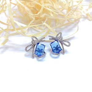 Pendientes colgantes High-grade Sense Crystal Bow Snow 925 Silver Needle Korean Personality Studs Ins Ethos Ear Accesorios al por mayor