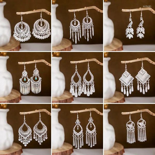 Pendientes colgantes de imitación de plata para mujer, aretes colgantes de aleación de hoja hueca con campana de pavo real a la moda, joyería