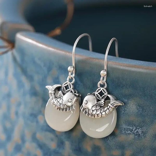 Boucles d'oreilles pendantes en Jade blanc Hetian naturel en forme de poisson pour femmes, Style chinois rétro, breloques uniques exquises, bijoux en argent