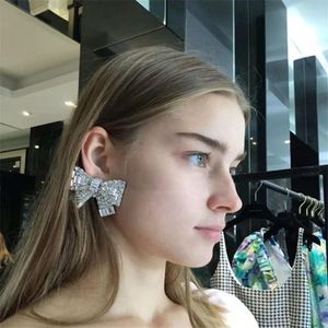 Boucles d'oreilles pendantes de luxe avec nœud en strass pour femmes, cristal brillant, bijoux de fête de mariage, vente en gros