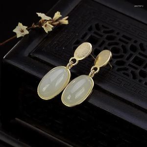 Boucles d'oreilles en peluche conception d'origine naturelle ovale de jade blanc hetian pour les femmes de style chinois