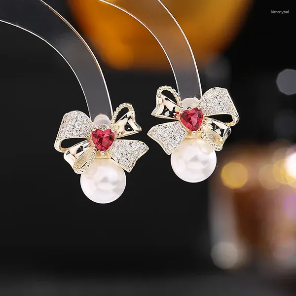 Pendientes de colgación S925 Silver Needle Marea de moda coreana Neta de temperamento rojo Love Bow Pearl Jewelry al por mayor