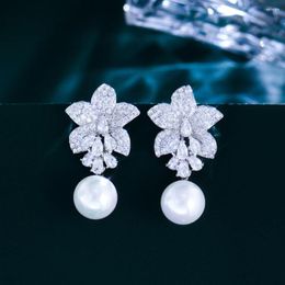 Boucles d'oreilles pendantes ThreeGraces brillant blanc zircon cubique simulé perle longue fleur pour les femmes à la mode bijoux de mariage de mariée E1855