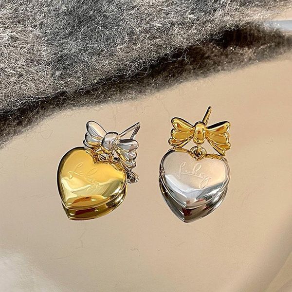 Boucles d'oreilles pendantes deux tons avec nœud papillon en forme de cœur pour femmes, bijoux de luxe minimalistes mignons Kawaii, 2023