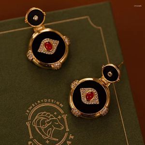 Boucles d'oreilles pendantes Vintage oeil noir pour femmes, personnalité Premium, pendentif rond de luxe, bijoux d'oreille classiques Cool