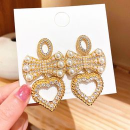 Dange oorbellen Vintage Luxe Bowknot Drop 2023 Trend Imitatie Pearls Dames Dangler Fashion Sweety Koreaanse oorrang sieraden Pendientes Cha