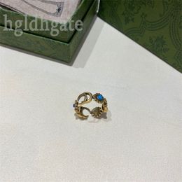 Donkerblauwe cryatal designer ring madeliefjebloem vergulde gouden ring designer g dubbel patroon ijskoude metalen shinne letters charme ringen voor vrouwenliefhebbers vintage ZB038 F23