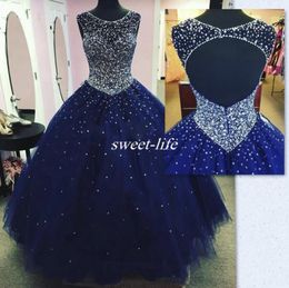 Robe de quinceanera bleu foncé 2020 Plus taille Backless Crysatl Boule de bal perle Tulle Debutante Gowns Vestido 15 Anos5279228