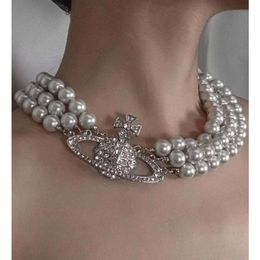 Dark Glory Yan Zhen Kendou Collar de perlas de emperatriz viuda del mismo estilo Cadena de collar de Saturno de diamantes exagerados