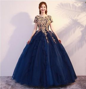 Donkere marine en gouden baljurk Bescheiden Prom Jurken met Cap Sleeves Prinses Lace-Up Back Kant Tulle Teens Modeste Prom Party Jurken Custom Made