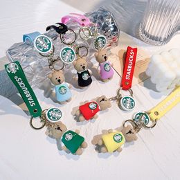 Decompressiespeelgoed Exquise Bear Barista Doll Keychain Milk Tea Cup Key Hangende sieraden ornamenten Kleine geschenken