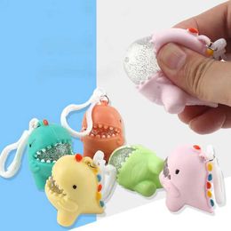 Decompressie Toy TPR Cartoon Dinosaurus Water Polo Pink Music Cartoon Soft Rubber Keychain Vent Ball ontworpen om stress te verlichten als een kinderen