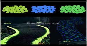 Decoraties 2550 pcs Stone Luminous gloeien in de donkere tuin Pebbles Glow Stones Rocks Buiten Pool Wandelingen Pad Patio Lawn Qylb5542636