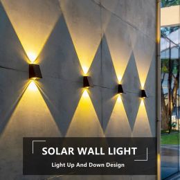 Décorations Nouvelles LED extérieurs Solar Mur Light Garden Villa Courtyard Porche paysage lampe décorative de haut en bas Lumsin de masque de mur lumineux