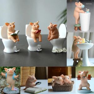 Figurines décoratives mignonnes cochon sur la figure de toilette exercice exercice de décoration intérieure jardin miniature animal bourse décoration toys cadeau pour les enfants