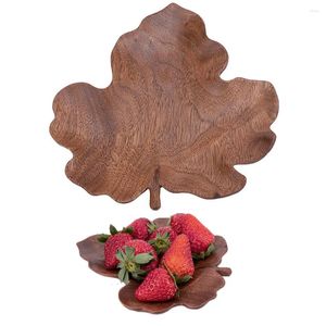 Decoratieve beeldjes bladpatroon houten kom fruitgerechten schotel theesas dessert diner brood houten borden vakantiedecoratie