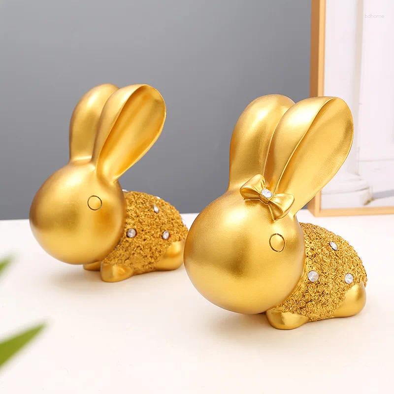 Dekorativa figurer Två gyllene kaniner harts gjorde högkvalitativt känsligt hemmakontor inomhus dekoration hantverk