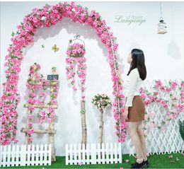 Flores decorativas Luyue 11 unids/lote flor de cerezo artificial vides boda colgando flores de seda falsas simulación rosa ratán colorido