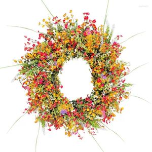 Fleurs décoratives printemps couronne de couronne florale et eucalyptus verts fausses fleur