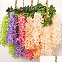 Guirnaldas de flores decorativas 12 Unids / set 110 Cm Seda Artificial Wisteria Vine Flor Colgante Banquete de boda Jardín Vegetación al aire libre Offi Dhx4Z