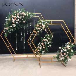 Fleurs décoratives couronnes jarown en fer forgé hexagonal arc cadre de mariage fond de mariage décoration fleur décoration à la maison écran 259k