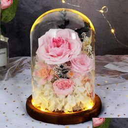 Couronnes de fleurs décoratives Saint Valentin Fête des mères Cadeau de fête de mariage Rose préservée Fleurs immortelles dans un dôme de verre avec lampe Home Deco Dhkps