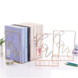 Objets décoratifs Figurines 2pcs paire créative en forme d'amour serre-livres en métal support de rangement de bureau étagère organisateur de livre support 230710 Dr Dh7K1