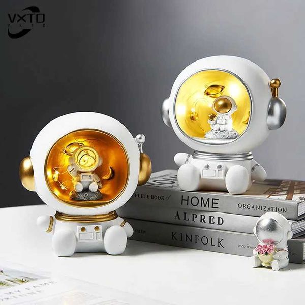 Objets décoratifs Figurines astronaute nocturne légère banc de piggy banc de résine créative modèle de caractère nordique décoration intérieure salon de bureau de décoration t240505