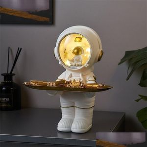 Objets décoratifs Figurines Creative Astronaut Statue Plateau de rangement Nordic Home Decor Bureau Figurine Salon Table Clé 220518 Drop Ot1Xi