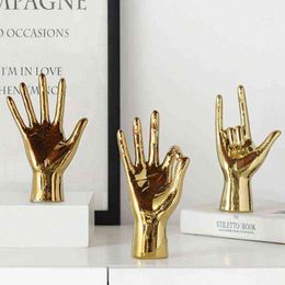 Decoratieve objecten Figurines Noordse gebaar vinger Figurine Gold Pating Hand Ornament Modern Home Decoration Accessories Room Desktop Resin SCLUpture T220902