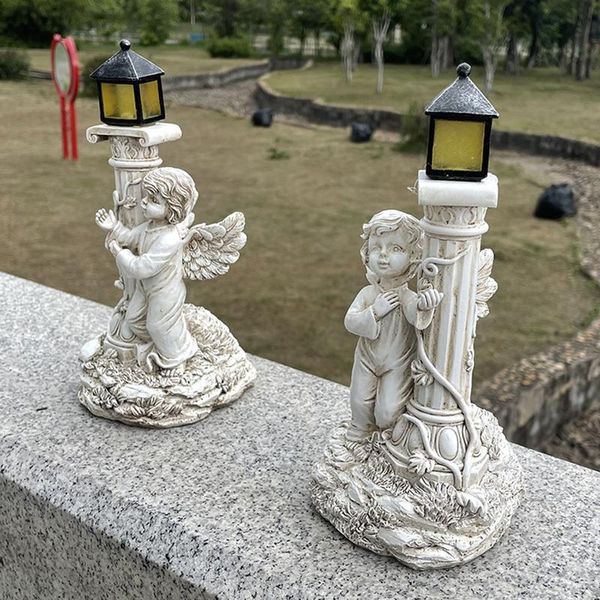 Objetos decorativos Figuras Estatuas de jardín solar al aire libre Escultura de ángel con estatuas alimentadas Luces LED impermeables para patio césped 230812