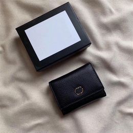 Délicat hommes femmes pinces à billets couche supérieure en cuir portefeuilles pliants porte-carte porte-monnaie unisexe Mini portefeuille avec Box279j