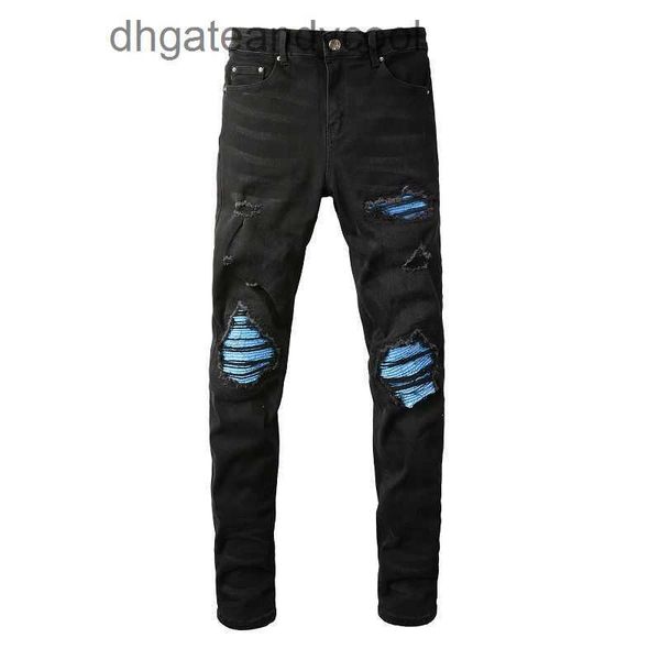 Denim Amiryes Jeans Pantalones de diseñador Hombre Moda Marca Agujero roto Parche de tela azul Elástico Adelgazante Lavado negro Mostrar delgado Versátil Pierna pequeña Pantalones de mezclilla Hombres W7ZP