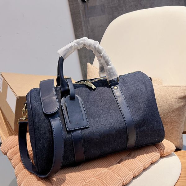 Poiiller en denim Top Handle Tapes Sacs Duffel Sobrave détachable Bodage Bodage Voyage Holiday Grand Capacité Designer France Mens Womens Handsbags 35x22cm