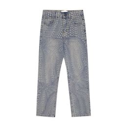 Biker de conception de stretch en denim Ajustement pour mince pantalon de la jambe de garniture de patch peint.