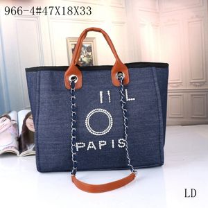 Sac fourre-tout en denim Sac à main Sac à provisions Nouveau sac de plage en toile Sac pour femme haut de gamme Style polyvalent Marque de luxe Sac de grande capacité Mini sac de créateur tn Grèce broderie 47