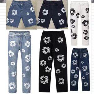 Denims larmes hommes jeans femmes mans denims jeans pantalons déchirés streetwear shorts de mode Mens Zip Breeches Bouton en métal Skinny Slim Patchy Pantalon de créateur lavé à l'eau