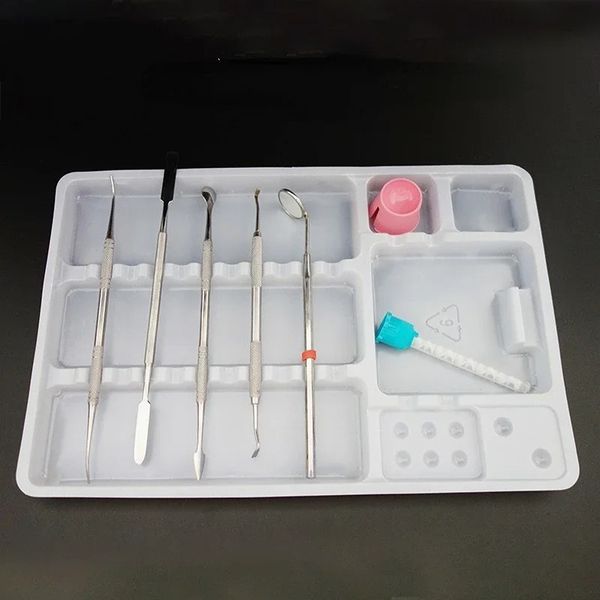 Plateau d'instruments en plastique dentaire pour organiser et séparer efficacement les appareils d'instruments dentaires et les consommables en ségrégation