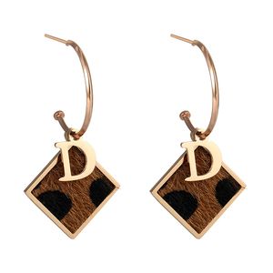 Boucle d'oreille pendante lustre léopard lettre carré tempérament à la mode sexy boucles d'oreilles visage mince diamant femme