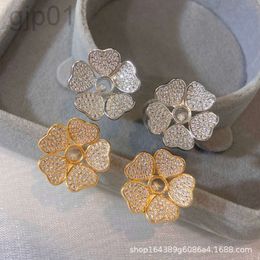 Ontwerper chopard sieraden Xiao Family Love Rose goud platina volledige diamanten oorbellen met vrouwelijke hartvorm vijf bloemblaadjes bloem mode oorbellen voor allergiepreventie