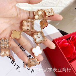 Desginer Clover Desginer Clover Spécialisé Fanjia Quatre Feuilles Herbe Montre Femme Bracelet Quartz Montre Femme Cadran en Forme de Fleur Bijoux Lumière Luxe