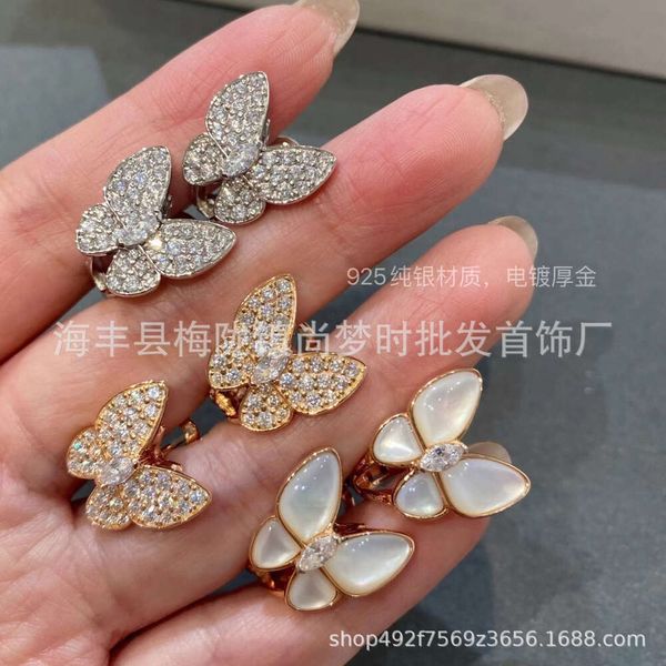 Desginer Clover Seiko Edition Full Diamond Horse Eyes Butterfly Ear Studs Ins Fashion Trend White Fritillaria Butterfly Ear Clip Diffusion en direct