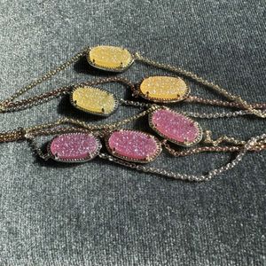 Desginer Kendras Scotts collier bijoux Kselisa Mulberry collier de dent en cristal violet collier de dent en cristal jaune cluster de cristal elliptique géométrique