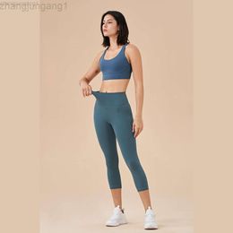 Ontwerper Lululemom BH's Lululemmon-stijl met hoge elasticiteit, geen ongemakkelijke draad en een nude-gevoel.Zak aan de achterkant, perzikkleurige billen en sportieve cropped yogabroek