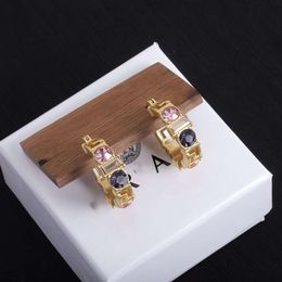 Desginer Vercaces Jewelry Nouveau matériau en laiton Fanjia Du Meijia Palindrome exquisement incrusté de strass boucles d'oreilles haut de gamme et à la mode