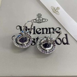 Desginer Viviene Westwoods impératrice douairière diamant complet 3d terre planète boucles d'oreilles femme Vivian Punk violet planète Ufo boucles d'oreilles haute édition