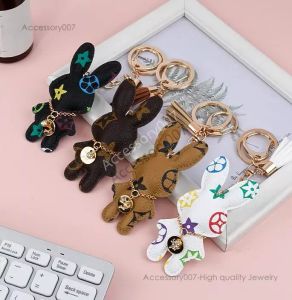 desigenr sieraden Designer sleutelhangers konijn PU lederen sleutelhangers portemonnee hanger auto sleutelhanger ketting charme bruine bloem mini tas kwast cadeau voor mannen vrouwen