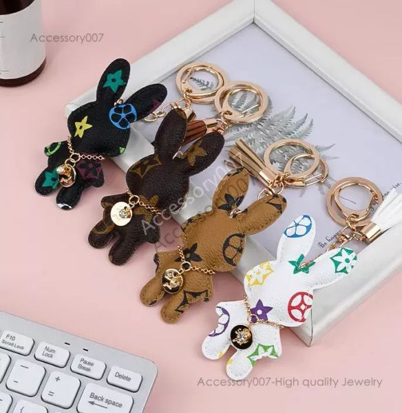 desigenr Jewelry Porte-clés de créateur en forme de lapin en cuir PU avec pendentif pour sac à main, porte-clés de voiture, charme, fleur marron, mini sac, pompon, cadeau pour homme et femme