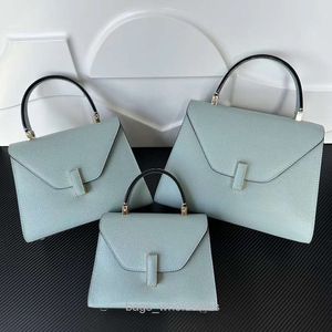 Les sacs design sont vendus à bas prix Sac pour femmes 2024 Luxe Riveté Épaule Croix Nuage Taille Aisselles En Cuir
