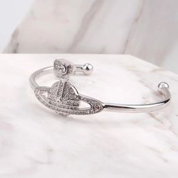 Ontwerp Saturnus armband prachtige en hoogwaardige openingsarmband dames mode handstuk sieraden